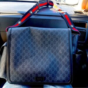 Selling my Gucci diaper bag . Great condition